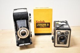 Two 1950s Kodak 620 film cameras made in the UK. A Kodak Junior II folding camera in excellent