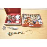 A quantity of 20th-century costume jewellery, to include brooches, beaded necklaces, pin badges
