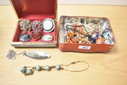 A quantity of 20th-century costume jewellery, to include brooches, beaded necklaces, pin badges
