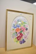 Artist unknown, 20th century oval watercolour, colourful study of flowers, within a card mount and