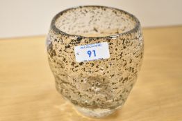 A contemporary studio art glass, of bulbous form, characterised by an organic, heavily textured