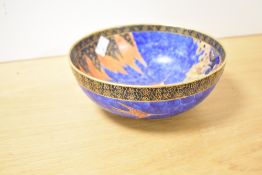 A 20th-century Carlton Ware lustre bowl, featuring a pair of hummingbirds in flight against an