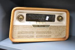 A vintage Perdio transistor radio, 40cm x 22cm, condition is consistent with age and use, missing