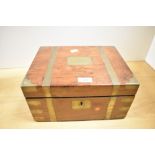 A Victorian brass-mounted walnut writing slope, the exterior plate engraved ‘TJC’ in gothic