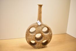 An unusual 19th-century Middle Eastern camels stomach long-necked flat water bottle, decorated