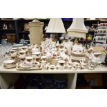 A large quantity of 20th-century Royal Albert bone china 'Country Rose', featuring a delicate rose