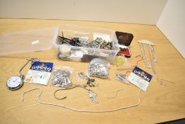 A quantity of modern jewellery making supplies, to include earring hooks, earring backs, chains
