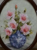 Joan Butler (20th/21st Century) Watercolour, a still life study of roses in a blue vase, signed