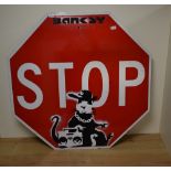 An interesting unauthorised 'BanksyLand' Banksy Retrospective American stop sign, (painted metal