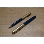 A Parker 51 aerometric fill fountain pen and clutch pencil set in Midnight Blue with Rolled Gold
