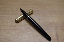 A Parker 51 aerometric fill fountain pen in Black with Rolled Gold converging line cap. Circa 1953