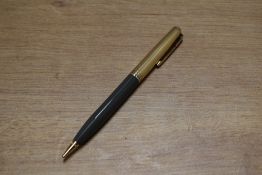A Parker rotary Vacumatic pencil in Dove Grey with gold filled parallel lined cap. Circa 1945