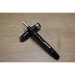 A Conway Stewart Executive 60 lever fill fountain pen in Black Cracked Ice with wide cap band having