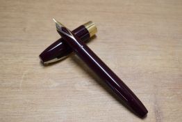 A boxed Sheaffer Pen For Men III snorkel fill fountain pen in Burgundy with Gold trim having