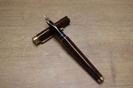 A Sheaffer Targa 1030 cartridge fill fountain pen in Thuya Ronce Laque having Sheaffer14K 585 nib.