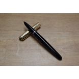 A Parker 51 aerometric fill fountain pen in Black with Gold fill cap. Circa 1948