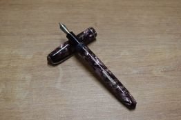 A Conway Stewart 75 lever fill fountain pen in Brown Marble with single cap band having Conway