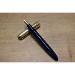 A Parker La Plume Lady aerometric fill fountain pen in Blue with Gold Fill cap having Parker 18K