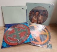 A five record lot of Marillion interest with a 10 inch , a 7 inch and threee limited edition picture