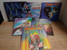 A Marillion lot of six 12 inch singles in VG+ or better - progressive rock interest
