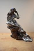 A large Art Deco style resin figurine, signed 'Alice Heath' to reverse, measures 46cm tall,