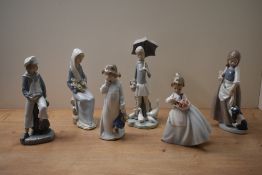 A group of six Lladro and Nao by Lladro figures and figurines to include 'Boy with Yacht' model