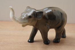 A mid century pottery elephant study, bearing stamp '531' to underside, measuring 12cm tall.
