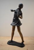 A large Art-Deco style patinated metal study of a violinist, raised on oval base, measures 47cm