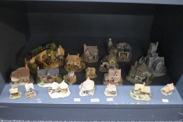 A selection of nineteen Lilliput Lane models to include 'The Flying Scotsman', 'Clare Cottage', 'The
