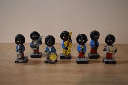 A group of seven vintage Robertson Jam band figures.