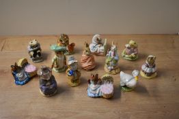 A group of thirteen Beswick Pottery and Royal Albert bone china Beatrix Potter character studies
