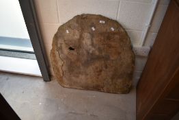 A weathered stone roof tile or similar, approx. Max dimensions 78 x 78cm