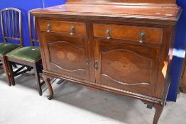 A late 19th/early 20th Century mahogany sideboard having ledge back , on cabriole legs, width