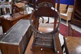 An Oriental hardwood embroidery or dinner gong frame, width approx. 37cm