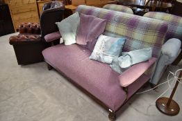A Victorian mahogany framed settee having later colourful tweed upholstery, width approx. 150cm