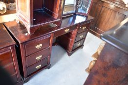A selection of reproduction mahogany bedroom furniture