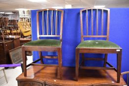 A set of six early 20th Century mahogany railback dining chairs, having drop in dralon seats