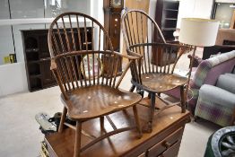 Two similar 19th Century Windsor style armchairs having spindle backs and crinoline stretchers