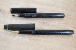 Two Fountain Pens. A Summit S100 lever fill in BHR with Warrented 14CT nib, and an De La Rue Onoto