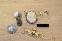 A small group of brooches, including a Royal Navy Submariners sweetheart brooch, Australian motif