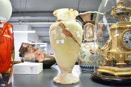 A 20th-century Neoclassical-style polished onyx marble decorative vase, of baluster form,