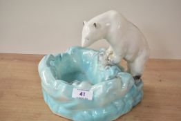 An early 20th century Czechoslovakian ceramic polar bear ashtray receptacle, designed by Ditmar