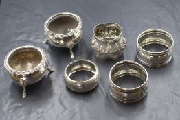 A pair George V silver salts, of circular form having a flared moulded rim, raised on three cabriole
