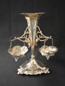 A George V silver epergnes, of traditional form having a pierced flared rim over a fluted body
