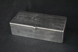 A George V silver cigarette box, of hinged rectangular form having engine turned decoration and