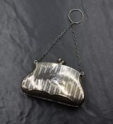 A George V silver purse, having engine turned decoration and monogram engraved to a circular