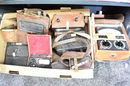 A carton of assorted multimeter devices including a 1950's Bakelite fronted ACWEECO AVO Multiminor