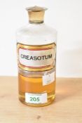 A single Victorian Apothecary bottle, with glass stopper and label reading 'CREASOTUM', 15cm,