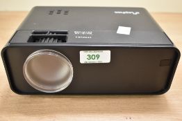 A vintage Elephas W13 mini portable LCD LED projector.