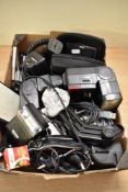 A box of photographic equipment including flashes, etc